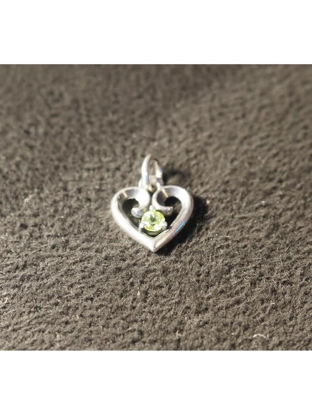 James Avery Remembrance Heart Charm featuring a peridot stone